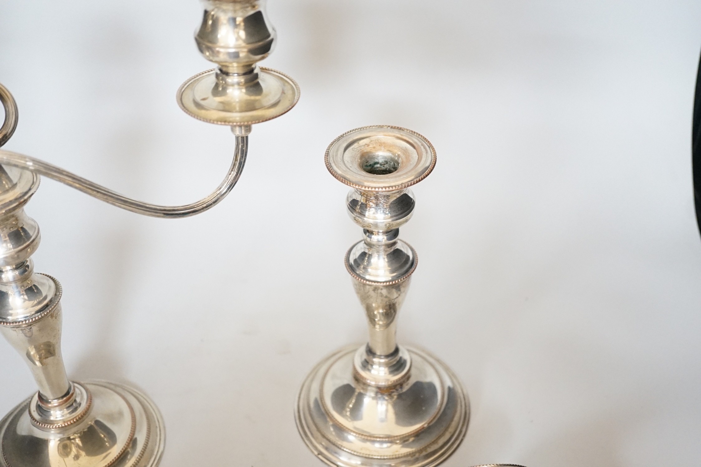 A pair of silver plated candelabra